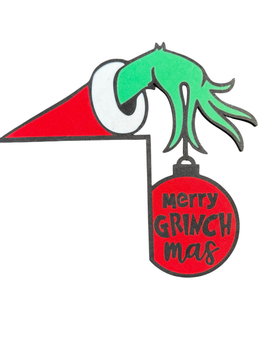Funny Holiday Door Topper – Mischievous Green Hand Holding Ornament | Christmas Window or Door Frame Decor (Right Side)